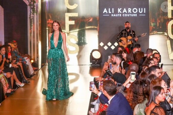 Exclusif - Défilé de la 15ème édition du Casa Fashion Show "Casa Fashion Show Automne/Hiver 2019-2020" au Sofitel Casablanca Tour Blanche à Casablanca, le 12 octobre 2019. Devenu un rendez-vous incontournable, l'événement porté par K. Cheddadi et chorégraphié par H. Ghorab, se veut le reflet d'une société plurielle et avant-gardiste, jonglant avec brio entre ses racines orientales et sa culture occidentale. L'enseigne marocaine de luxe IO est la chaussure officielle de l'événement et l'Oréal Paris, le partenaire coiffure et make up 2019. La création des costumes de scène confiée pour la première fois à une jeune designer africaine de talent, Laetitia Kandolo, réputée dans le milieu de la mode grâce à ses collaborations avec des célébrités mondiales. L'événement soutient depuis son lancement l'Association des Bonnes Œuvres du Coeur . Pour l'hiver 2019-2020, le Casa Fashion Show invite le public à une ballade vintage et ensoleillée, au son d'un morceau jazzy ponctué de mandoline... Avec comme toile de fond : l'Italie. L'Italie et sa douceur de vivre. L'Italie et ses symboles : motifs floraux, couleurs chatoyantes, broderies, brocarts, camaieu de rouges etc... Invité d'honneur de cette 15ème saison, K. Girac a fait vibrer le public au son de ses titres les plus emblématiques, accompagné de la chanteuse américaine C. Milian. Un événement en partenariat avec Sofitel Casablanca, l'Agence Marocaine de Coopération Internationale, Royal Air Maroc, Volkswagen, Samsung, Lesieur Cristal et Upline Group. © Philippe Doignon/Bestimage
