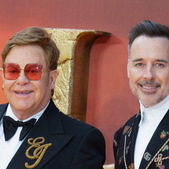 Elton John et son mari David Furnish à la première du film "Le Roi Lion" au cinéma Odeon Luxe Leicester Square à Londres, le 14 juillet 2019.