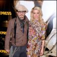 Johnny Depp et Amber Heard au photocall du film "Rhum Express" à Paris le 8 novembre 2011.