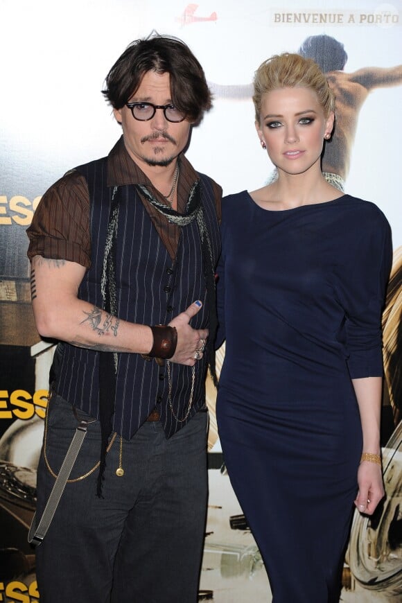 Johnny Depp et Amber Heard à l'avant-première de Rhum Expressau Gaumont Marignan à Paris en novembre 2011. © Guillaume Gaffiot