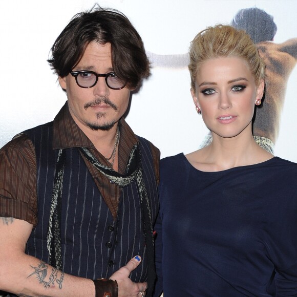 Johnny Depp et Amber Heard à l'avant-première de Rhum Expressau Gaumont Marignan à Paris en novembre 2011. © Guillaume Gaffiot