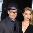 Johnny Depp et sa fiancée Amber Heard à la première du film "3 Days to Kill" à Hollywood, le 12 février 2014.