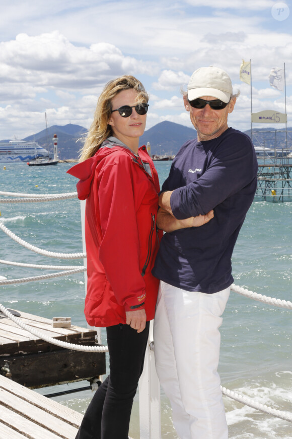 Exclusif - Philippe Poupon et sa femme Géraldine Danon en séance de pose sur la plage Bâoli pendant le 69e Festival international du film de Cannes le 12 mai 2016. © Philippe Doignon/LMS/Bestimage