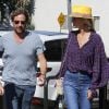Laeticia Hallyday et son compagnon Pascal Balland ressortent du restaurant de sushi avec Marine, l'ex-femme de Pascal Balland, à Los Angeles, avant d'aller chercher leurs filles à l'école. Le 13 septembre 2019.
