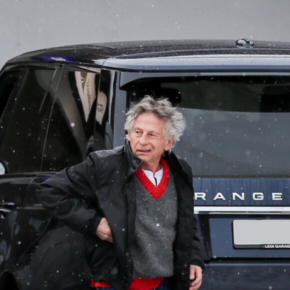 Exclusif - Roman Polanski et sa femme Emmanuelle Seigner accompagnent des membres de leur famille, les parents d'Emmanuelle Seigner Jean-Louis et Aline Seigner et des amis à la gare de Gstaad, le 27 décembre 2014