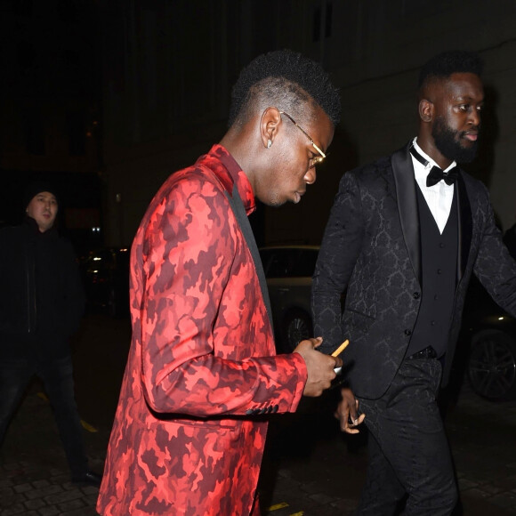 Paul Pogba quitte la soirée de lancement de la marque de vêtements "Jesse Lingard" au Peter Street Kitchen de Manchester le 9 décembre 2018.