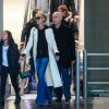 Laeticia Hallyday, sa fille Joy, Jimmy Reffas - Laeticia Hallyday arrive en famille avec ses filles et sa mère à l'aéroport Roissy CDG le 19 novembre 2019.