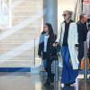 Laeticia Hallyday, sa fille Joy, Jimmy Reffas - Laeticia Hallyday arrive en famille avec ses filles et sa mère à l'aéroport Roissy CDG le 19 novembre 2019.
