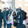 Laeticia Hallyday, ses filles Jade et Joy, Françoise Thibaut, la mère de Laeticia Hallyday - Laeticia Hallyday arrive en famille avec ses filles et sa mère à l'aéroport Roissy CDG le 19 novembre 2019.