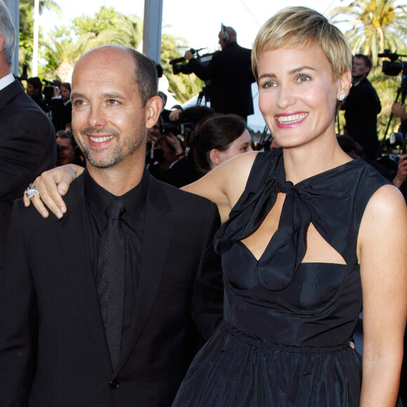 Maurice Barthélemy et Judith Godrèche lors de la montée des marches du film "The Artist" lors du 64e Festival de Cannes le 15 mai 2011.