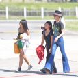 Laeticia Hallyday et ses filles Jade et Joy à leur arrivée à l'aéroport de Saint-Barthélemy. Son amie Liliane Jossua et son fils Gabriel Bogliolo sont venus les accueillir. Le 4 décembre 2019.