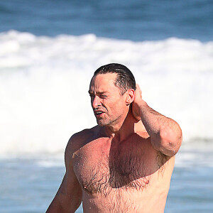 Exclusif - Hugh Jackman est allé se baigner sur la plage de Bondi Beach à Sydney en Australie, le 4 août 2019