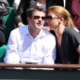 Herve Mathoux et sa femme Maryline Olivie - Jour 10 - People aux Internationaux de France de tennis de Roland Garros lors du match de Jo-Wilfrid Tsonga contre Roger Federer le 4 juin 2013.