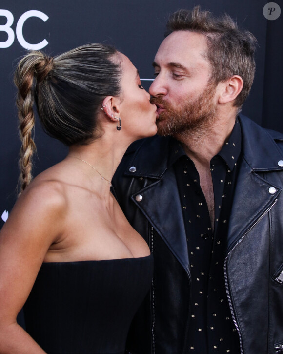 David Guetta et sa compagne Jessica Ledon - People à la soirée des "Billboard Music Awards 2019" au MGM Grand Garden Arena à Las Vegas. Le 1er mai 2019.