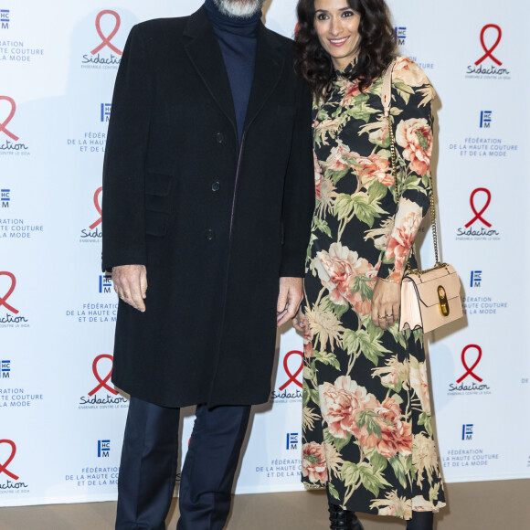 Eric Cantona et sa femme Rachida Brakni lors du photocall de la 18ème édition du "Dîner de la mode du Sidaction" au Pavillon Cambon Capucines - Potel et Chabot à Paris, France, le 23 janvier 2020. © Olivier Borde/Bestimage