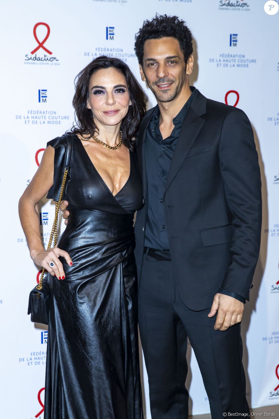Tomer Sisley et sa femme Sandra lors du photocall de la 18ème édition du Dîner de la mode du