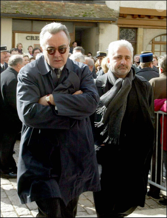 Alain Ducasse et Guy Savoy aux funérailles de Bernard Loiseau à la basilique Saint-Andoche, à Saulieu, le 28 février 2003.