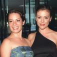 Alyssa Milano et Holly Marie Combs arrivent aux "MakeUp Artists and Hair Stylists Guild Awards". Los Angeles. Le 19 mars 2000. © Blackbird/ABACA