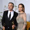 Alfonso Cuaron, Angelina Jolie - Pressroom - 86ème cérémonie des Oscars à Hollywood, le 2 mars 2014.