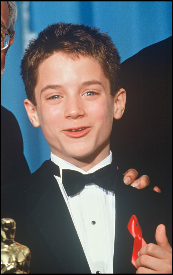 Elijah Wood lors des Oscars, le 24 mars 1994 à Los Angeles. 