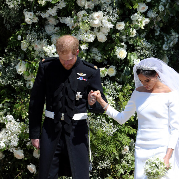 Le prince Harry, duc de Sussex, et Meghan Markle, duchesse de Sussex, à la sortie de chapelle St. George au château de Windsor - Sortie après la cérémonie de mariage du prince Harry et de Meghan Markle en la chapelle Saint-George au château de Windsor, Royaume Uni, le 19 mai 2018.