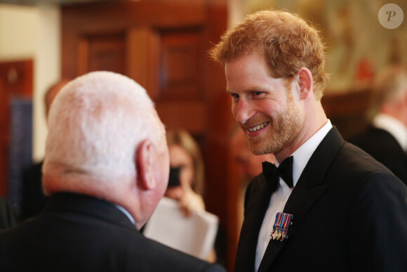 Le prince Harry assiste à une réception à la Trinity House à Londres, le 19 juillet 2017, pour le projet Vernon, une campagne pour installer un monument en héritage de l'établissement de la Marine Royale HMS Vernon.