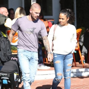 M. Pokora et sa compagne Christina Milian se baladent avec leur fils Isaiah dans le quartier de West Hollywood à Los Angeles. La petite famille est allée déjeuner chez Fred Segal. Le 11 février 2020