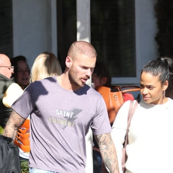 M. Pokora et sa compagne Christina Milian se baladent avec leur fils Isaiah dans le quartier de West Hollywood à Los Angeles. La petite famille est allée déjeuner chez Fred Segal. Le 11 février 2020