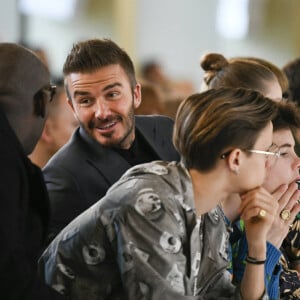 David Beckham et ses enfants Romeo, Cruz et Harper assistent au défilé Victoria Beckham (collection automne-hiver 2020-2021) à la Banqueting House. Londres, le 16 février 2020.