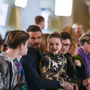 David Beckham et ses enfants Romeo, Cruz et Harper assistent au défilé Victoria Beckham (collection automne-hiver 2020-2021) à la Banqueting House. Londres, le 16 février 2020.