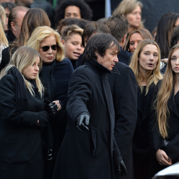 Sylvie Vartan, Darina Scotti, Ilona, Emma Smet, Estelle Lefébure - Sorties de l'église de la Madeleine après les obsèques de Johnny Hallyday à Paris le 9 décembre 2017. © Veeren / Bestimage