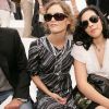 French singer and actress Vanessa Paradis and her sister Alysson pictured at the Chanel Fall-Winter 2006-2007 Haute-Couture collection held at 'Pelouse de Saint-Cloud' near Paris, France, on July 6, 2006. Photo by Nebinger-Taamallah/ABACAPRESS.COM 