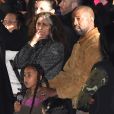 Kanye West et sa fille North au défilé Yeezy Season 8 à l'Espace Niemeyer. Paris, le 2 mars 2020.