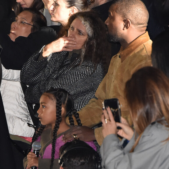 Kanye West et sa fille North au défilé Yeezy Season 8 à l'Espace Niemeyer. Paris, le 2 mars 2020.