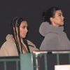Kim et Kourtney Kardashian au défilé Yeezy Season 8 à l'Espace Niemeyer. Paris, le 2 mars 2020.