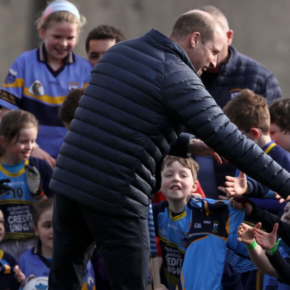 Le prince William, duc de Cambridge, et Catherine Kate Middleton, duchesse de Cambridge, lors d'une session de Hurling, un sport traditionnel irlandais au Knocknacarra GAA Club à Galway le 5 mars 2020.