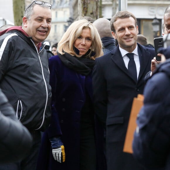 Le président Emmanuel Macron et sa femme Brigitte sur l'avenue des Champs-Elysée à Paris le 9 mars 2020. © Stéphane Lemouton / Bestimage