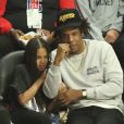 Jay-Z et sa fille Blue Ivy Carter assistent au match de NBA Los Angeles Clippers - Los Angeles Lakers au Staples Center. Los Angeles, le 8 mars 2020.