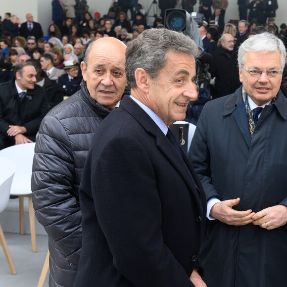 Jean-Yves Le Drian, ministre de l'Europe et des affaires étrangères, Nicolas Sarkozy, Didier Reynders commissaire européen à la justice, Anne Hidalgo, maire de Paris lors de la cérémonie à l'occasion de la première journée nationale d'hommage aux victimes du terrorisme sur l'Esplanade du Trocadero à Paris le 11 mars 2020. © Jacques Witt / Pool / Bestimage