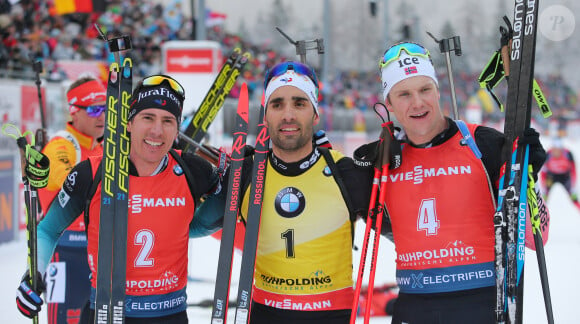 Quentin Fillon Maillet, Martin Fourcade et Vetle Sjaastad Christiansen lors de la poursuite de la Coupe du monde de biathlon à Ruhpolding, Allemagne, le 19 janvier 2020. © Gepa/Panoramic/Bestimage