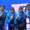 Quentin Fillon-Maillet, Simon Desthieux, Martin Fourcade et Emilien Jacquelin célèbrent leur titre de champions du monde du relais de biathlon le 22 février 2020 à Antholz (Italie).