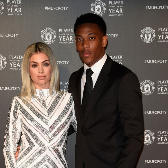 Anthony Martial et sa femme Mélanie Da Cruz lors de la soirée du prix du joueur de l'année de Manchester United 2019 au stade Old Trafford à Manchester, Royaume Uni, le 9 mai 2019.