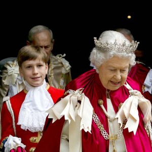 Info du 21 mars 2020 - Un employé de Buckingham Palace testé positif au Coronavirus alors que la reine était toujours à Londres La reine Elisabeth II d'Angleterre et le prince Charles d'Angleterre arrivent à l'abbaye de Westminster pour assister à l'office "The Order of the Bath" à Londres. Le 9 mai 2014