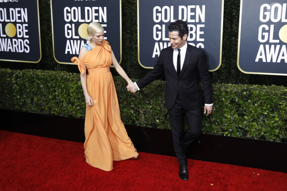 Michelle Williams, enceinte et son compagnon Thomas Kail - Photocall de la 77ème cérémonie annuelle des Golden Globe Awards au Beverly Hilton Hotel à Los Angeles, le 5 janvier 2020.