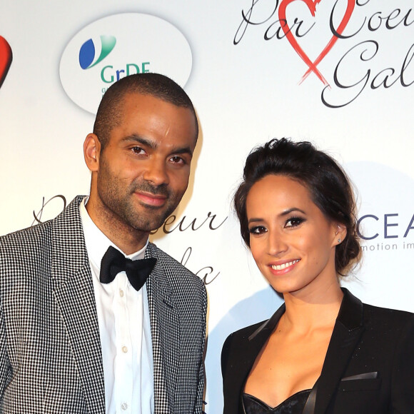 Tony Parker et sa femme Axelle Francine - Personnalités au gala "Par Coeur" pour les 10 ans de l'association "Cekedubonheur" au pavillon d'Armenonville à Paris. Le 24 septembre 2015.