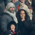 Exclusif - Amel Bent et son compagnon Patrick Antonelli assistent au match de Ligue des Champions Psg - Olympiakos Le Piree au Parc des Princes a Paris le 27 novembre 2013.