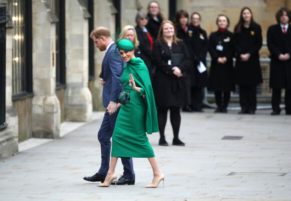 Le prince Harry, duc de Sussex, et Meghan Markle, duchesse de Sussex, lors de la cérémonie du Commonwealth en l'abbaye de Westminster à Londres, le 9 mars 2020. La robe sur-mesure de la duchesse signée Emilia Wickstead est estimée à plus de 2000 euros.
