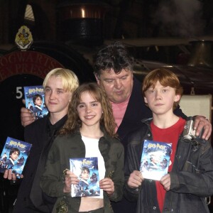 Robbie Coltrane, Rupert Grint, Emma Watson et Tom Felton à Londres, le 4 juin 2002. 