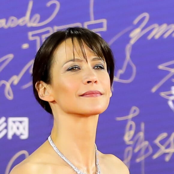 Sophie Marceau sur le tapis rouge de la cérémonie d'ouverture du 9ème festival international du film de Pekin, Chine, le 13 avril 2019.