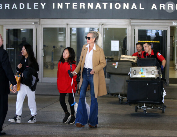 Exclusif - Laeticia Hallyday et ses filles Jade et Joy arrivent à l'aéroport LAX de Los Angeles en provenance de Paris, le samedi 11 janvier 2020 dans l'après-midi.